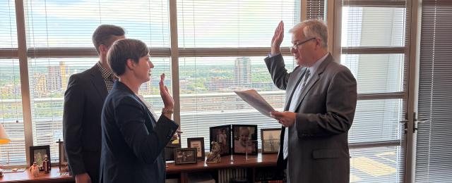 Chief Judge Schiltz administering the Oath of Office to new Magistrate Judge Elsa M. Bullard
