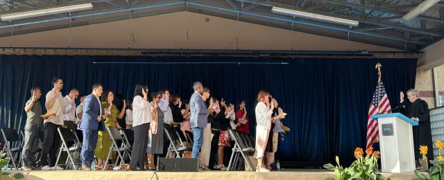 Naturalization ceremony at the MN State Fair International Bazaar stage